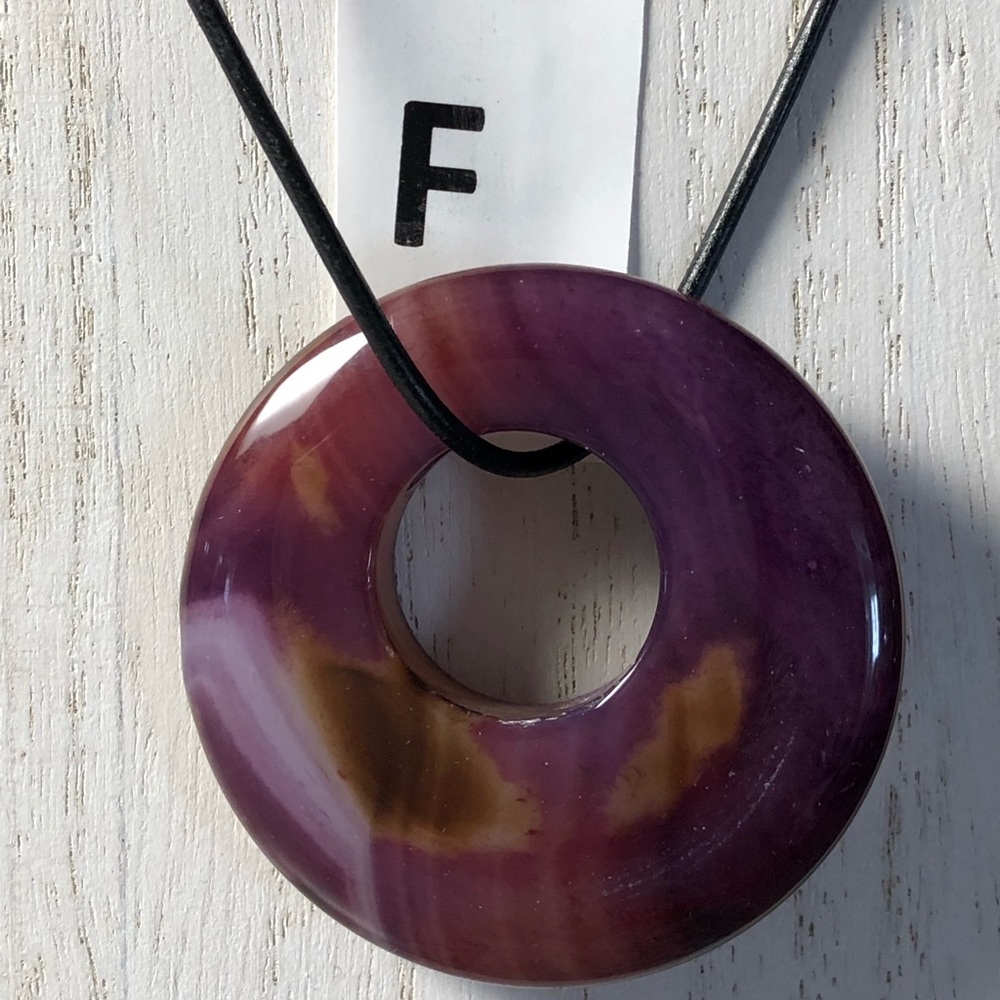 Fluorite necklaces on a leather cord.